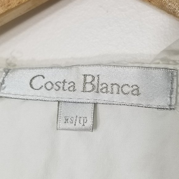 Costa Blanca | White Wrap Style Ruffle Neck Blouse - Picture 2 of 8